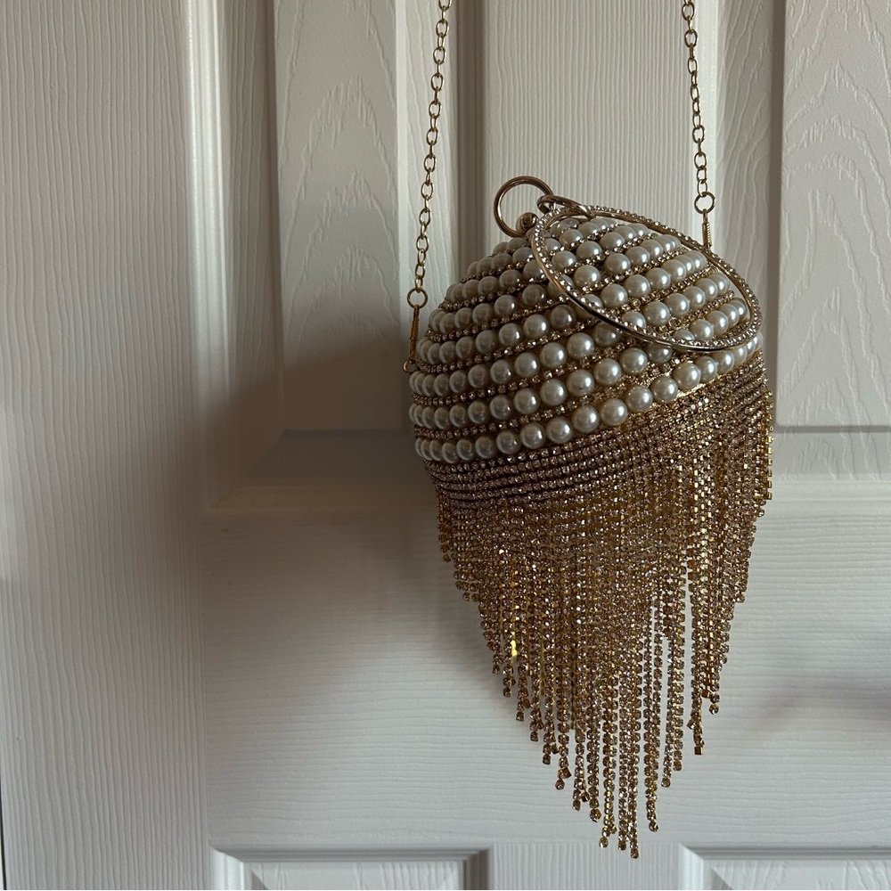 Gold and pearl rhinestone ball clutch